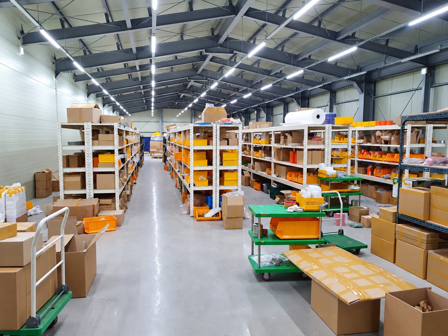 Aisles of shelving containing a wide variety of spare parts